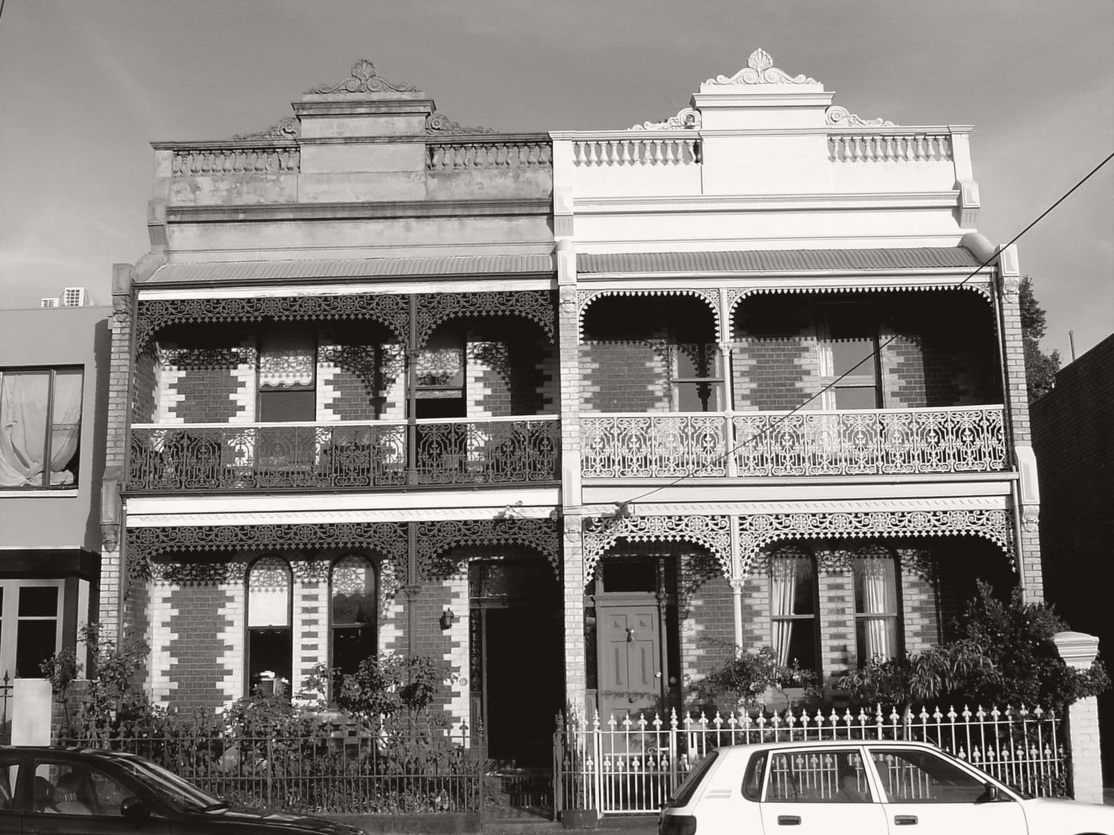 A row of late-Victorian terrace houses in inner Melbourne, printed in the paper's ink